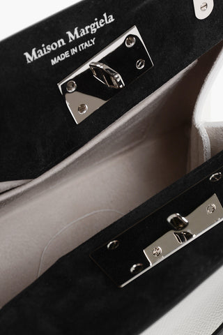 Schultertasche aus zweifarbigem Leder SNATCHED
