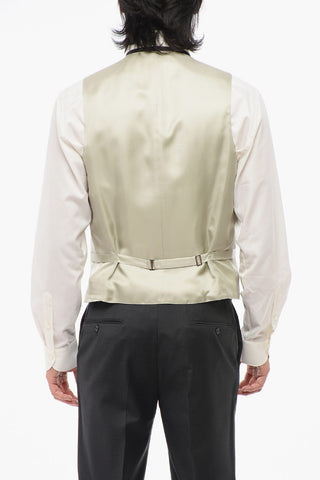 Wollweste mit 4 Knöpfen und Leistentasche