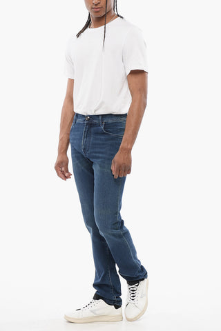 Washed Jeans with Embroidered Logo