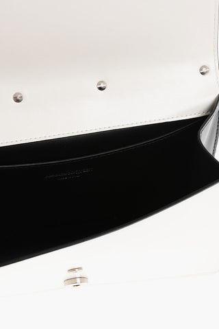 Two-Tone Leather SLASH Clutch with Jewel Detail