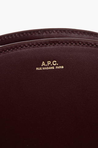 Leather DEMI-LUNE Crossbody Bag with Zipped Closure