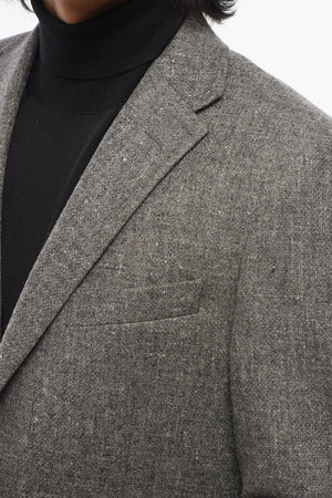 Einreihiger Blazer aus Wolle mit aufgesetzten Taschen