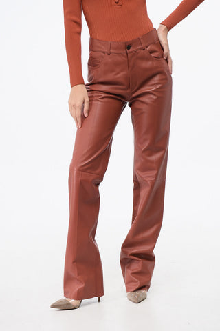 Pantaloni in Pelle a 5 Tasche con Bottone Logato
