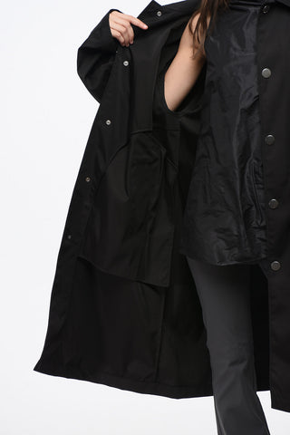 Solid-Color Raincoat with Silver Metal Logo