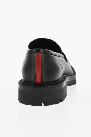 Embossed Leather Penny Loafers with Monogram Motif