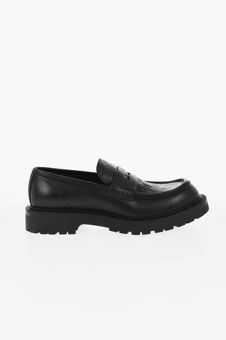 Embossed Leather Penny Loafers with Monogram Motif