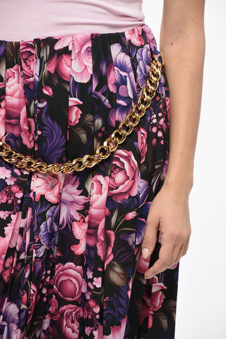 Long Pleated Skirt with Floral Pattern and Chain Detail