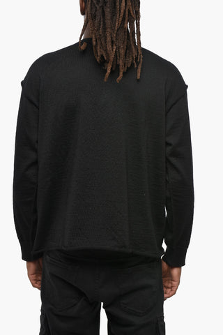 Rundhals-Pullover aus Schurwolle mit Tasche