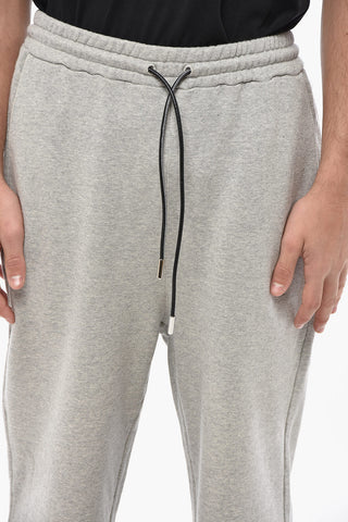 Baumwollfleece-Joggers mit gesticktem Logo und Bündchen