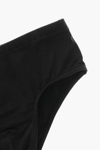 ICON Solid-Color Swim Brief with Contrasting Print