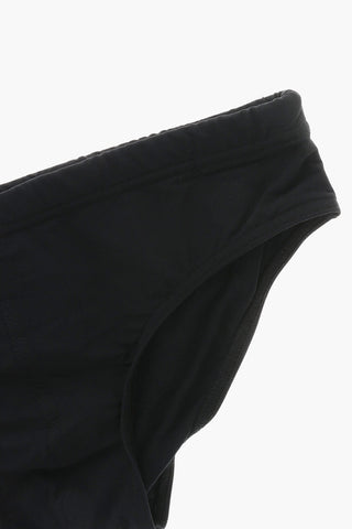 Slip-Badehose in Uni mit Maxi-Print-Logo