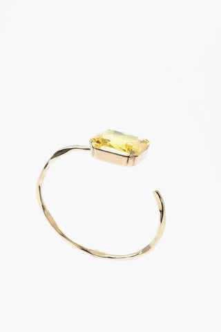 Armband aus goldfarbenem Metall mit Schmuckstein