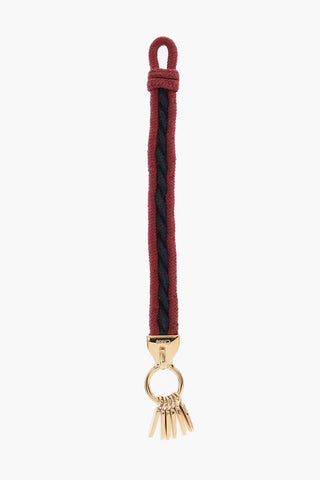 Zweifarbiges Kordelarmband mit Detail aus goldfarbenem Metall