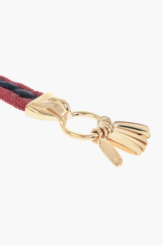 Zweifarbiges Kordelarmband mit Detail aus goldfarbenem Metall