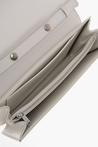 Pochette in Pelle TRIOMPHE con Tracolla Removibile