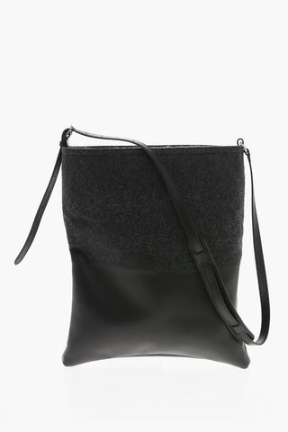Schultertasche aus Leder und Stoff