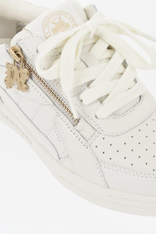 Sneakers Basse in Pelle Martellata con Zip Dorata