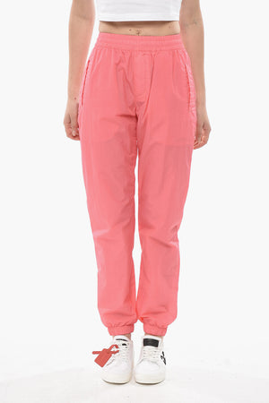 Joggers in Nylon mit 4 Taschen und Bündchen