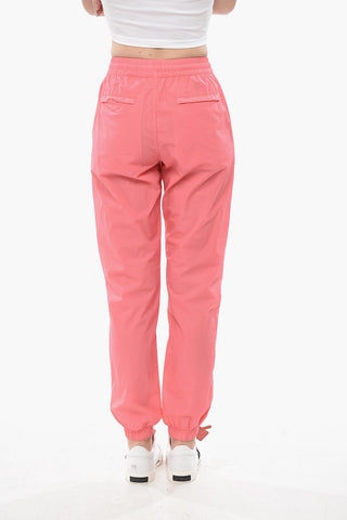 Joggers in Nylon mit 4 Taschen und Bündchen