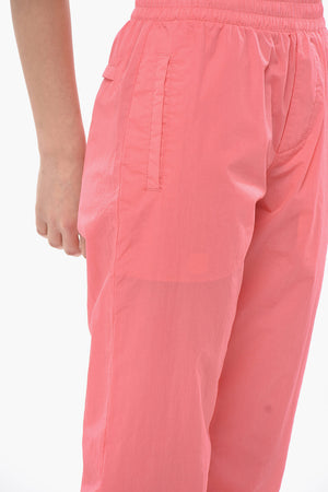 Joggers in Nylon mit 4 Taschen und Bündchen