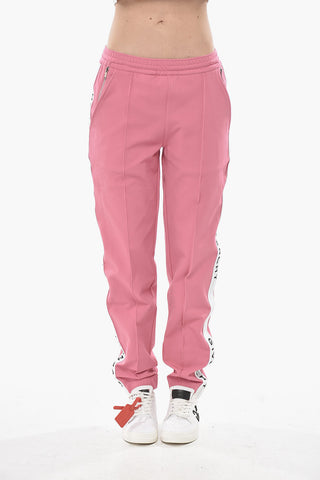 Joggers TAPE mit einer Bundfalte und seitlichen Logobändern