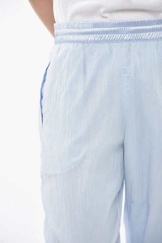 Joggers in Nylon mit 4 Taschen und Bündchen