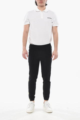 3-Taschen-Hose mit bedruckten Seitenstreifen und Bündchen
