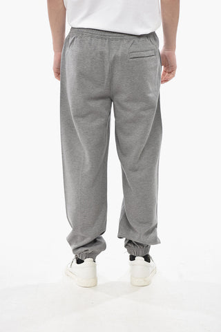 Jogginghose aus Stretch-Baumwolle mit vorderen Bundfalten und Bündchen