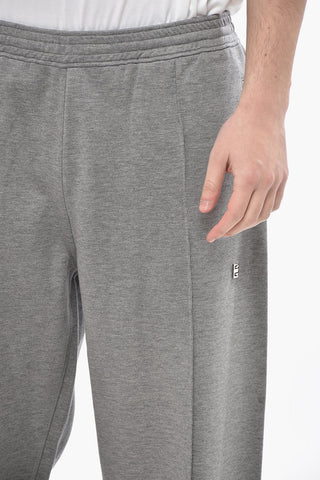 Jogginghose aus Stretch-Baumwolle mit vorderen Bundfalten und Bündchen