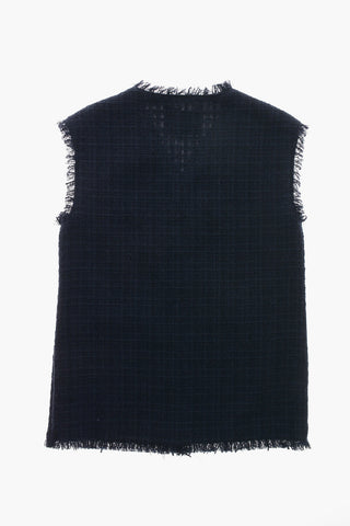 패치 포켓의 트위드 베스트