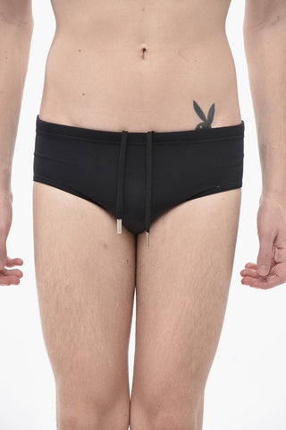 ICON Solid-Color Swim Brief with Contrasting Print