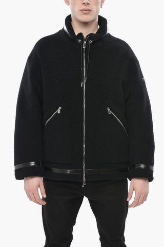 Einfarbige Daunenjacke mit Außenseite aus Wollmischung und Kunstlederbesatz