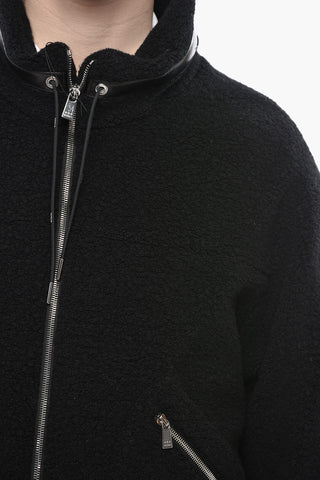 Einfarbige Daunenjacke mit Außenseite aus Wollmischung und Kunstlederbesatz