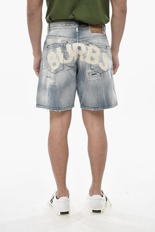 Shorts im Distressed-Look mit Logoknopf