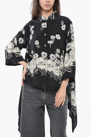 Seidenbluse mit Blumenmuster und seitlichen Drapierungen