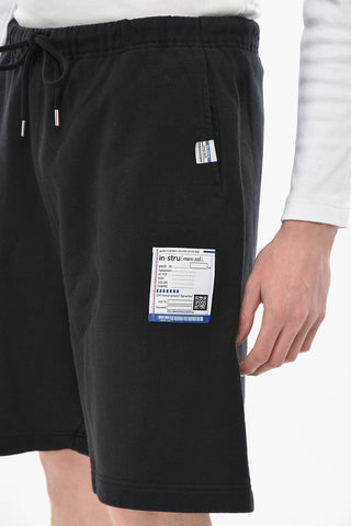 IN-STRU(MENTAL) Shorts aus angerauter Baumwolle mit Patch