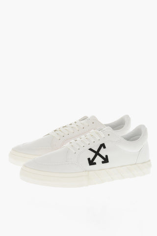 Niedrige Sneaker aus Canvas VULCANIZED mit kontrastierendem Monogramm