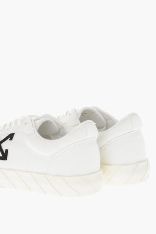 Niedrige Sneaker aus Canvas VULCANIZED mit kontrastierendem Monogramm