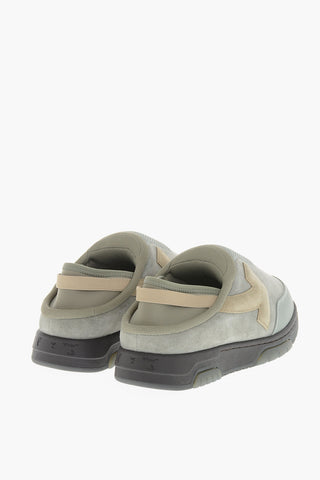 Mules OUT OF OFFICE aus Stoff und Wildleder