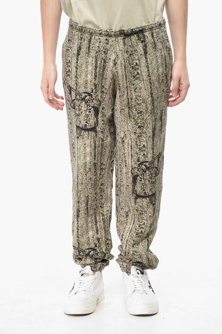 Joggers in Cotone Garzato con Motivo Camouflage