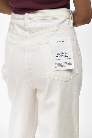 Wide-Leg Stretch Cotton Jeans With Raw Hem