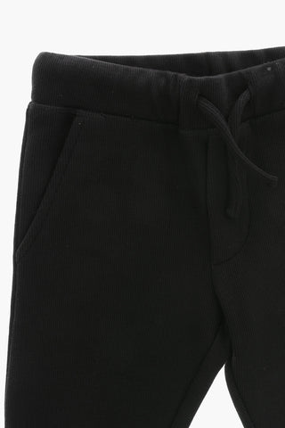 Unifarbene Jogginghose mit Relieflogo