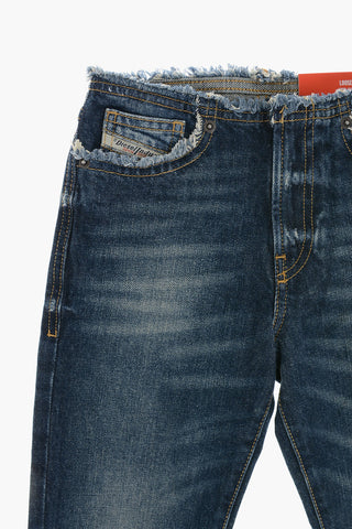 Stonewashed Jeans With Frayed Hem