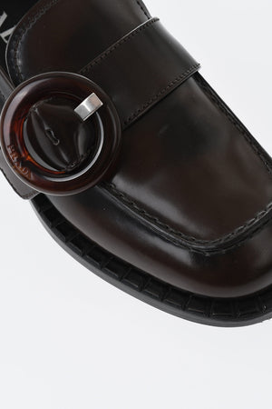 Brushed leather loafers with front buckle
