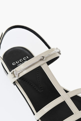 Flat leather sandals with front bit