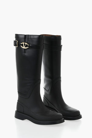 Leather and rubber boots with logo strap