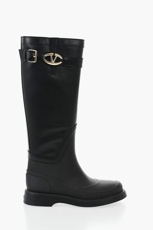 Leather and rubber boots with logo strap