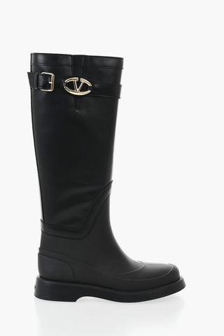 Leather and rubber boots with logo strap