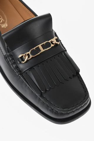 Kiltie-Mokassins aus Leder mit goldenem Metalldetail und quadratischer Spitze
