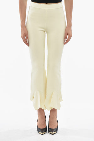 Enganliegende Strickhose mit ausgestelltem Saum im Peplum-Effekt